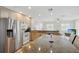 Open kitchen with stainless steel appliances and granite countertops at 10616 Ayear Rd, Port Charlotte, FL 33981