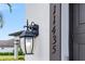 Exterior shot of home address number and light fixture at 11435 Apple Tree Cir, Bradenton, FL 34211