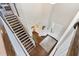 Grand foyer with hardwood floors and a staircase leading to the upper level at 11435 Apple Tree Cir, Bradenton, FL 34211
