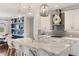Beautiful kitchen with stainless steel appliances, a large island, and pendant lighting at 11435 Apple Tree Cir, Bradenton, FL 34211