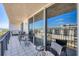 Spacious balcony with comfortable seating, and ocean view at 1212 Benjamin Franklin Dr # 708, Sarasota, FL 34236