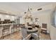 This dining area showcases a blend of kitchen and dining space at 1212 Benjamin Franklin Dr # 708, Sarasota, FL 34236