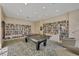 Fun game room, including a table tennis setup and a library, creating a space for both relaxation and activities at 1212 Benjamin Franklin Dr # 708, Sarasota, FL 34236