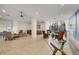 The luxurious lobby is a tranquil space with comfortable seating, bathed in natural light with beautiful neutral tile floors at 1212 Benjamin Franklin Dr # 708, Sarasota, FL 34236