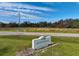 Entrance sign for Warm Mineral Springs Park in Florida, advertising a natural wellness experience at 12305 Harland St, North Port, FL 34287
