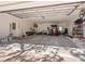 Spacious garage with lots of room for storage with an open door to the driveway at 1248 Northport Dr, Sarasota, FL 34242