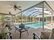 Relaxing screened-in patio area by the pool, perfect for enjoying outdoor living and entertaining at 1248 Northport Dr, Sarasota, FL 34242
