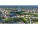 Lovely aerial view of homes in a well-maintained community with ponds and mature landscaping at 12628 Daisy Pl, Bradenton, FL 34212