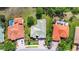 Aerial view of the property showcasing its serene setting with lush greenery, mature trees, and a spacious yard at 12628 Daisy Pl, Bradenton, FL 34212