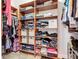 Walk-in closet with built-in shelving providing ample space for clothing and accessories at 12628 Daisy Pl, Bradenton, FL 34212
