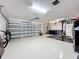 Very clean and organized garage with epoxy flooring and tons of storage at 12628 Daisy Pl, Bradenton, FL 34212