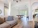 Open floorplan view showcasing the living room and game room with sliding glass doors at 12628 Daisy Pl, Bradenton, FL 34212
