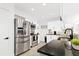Modern kitchen with stainless steel appliances and granite countertops at 1311 Cypress Ave, Venice, FL 34285