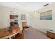 Bright dining area adjacent to the kitchen at 1343 Glendale W Cir # 216, Sarasota, FL 34232