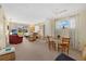 Inviting living and dining area filled with natural light, offering a comfortable living space at 1343 Glendale W Cir # 216, Sarasota, FL 34232