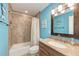 Bathroom with single vanity and shower over tub at 1500 Cove Ii Pl # 524, Sarasota, FL 34242