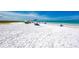 Enjoy a peaceful day on this pristine sandy beach, perfect for relaxation and soaking up the sun at 1500 Cove Ii Pl # 524, Sarasota, FL 34242