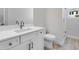 Bright bathroom featuring a modern vanity, white countertops, and ample storage at 1620 Sea Haven Dr # 404, Punta Gorda, FL 33950