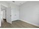 Bedroom showcasing an doorway and a closet with light wood floors at 1620 Sea Haven Dr # 404, Punta Gorda, FL 33950
