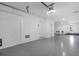 Spacious garage with painted walls and epoxy flooring at 1620 Sea Haven Dr # 404, Punta Gorda, FL 33950