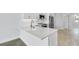 Contemporary kitchen featuring white countertops, modern fixtures, and stylish finishes at 1620 Sea Haven Dr # 404, Punta Gorda, FL 33950