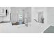 Modern kitchen with an open layout, featuring a bar and sleek countertops and fixtures at 1620 Sea Haven Dr # 404, Punta Gorda, FL 33950