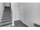 Modern staircase featuring sleek lines, stylish flooring, and ample natural light at 1620 Sea Haven Dr # 404, Punta Gorda, FL 33950