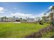 Community common ground and pool with well-kept landscaping and clear skies at 1620 Sea Haven Dr # 404, Punta Gorda, FL 33950
