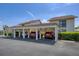 Exterior of home featuring assigned covered parking at 1759 Lake Pl # 1759-B, Venice, FL 34293