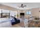 Comfortable living room with access to a screened patio at 1759 Lake Pl # 1759-B, Venice, FL 34293