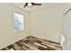 Bright bedroom with natural light, neutral walls, stylish floors, and closet at 17817 Woodland Ct, Punta Gorda, FL 33982