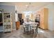 Open kitchen features a center island with marble countertop, stainless appliances, and light wood cabinets at 17817 Woodland Ct, Punta Gorda, FL 33982