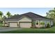 Charming single-story home features a symmetrical facade, two-car garage, and well-maintained landscaping at 18125 Cropside Trl, Lakewood Ranch, FL 34211