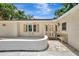 Welcoming front entrance featuring a seating area, elegant door, and charming details at 2924 Valley Forge St, Sarasota, FL 34231