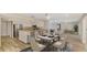 Kitchen open to dining room and living space with bright natural light at 2924 Valley Forge St, Sarasota, FL 34231