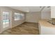 Kitchen with white cabinets, stainless steel appliances, and a view of the pool at 2924 Valley Forge St, Sarasota, FL 34231