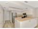 Bright kitchen with white cabinets and stainless steel appliances at 2924 Valley Forge St, Sarasota, FL 34231