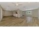 Spacious open-concept living area with tile floors and a view into the kitchen at 2924 Valley Forge St, Sarasota, FL 34231