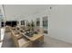 Covered patio with outdoor dining table setup for elegant poolside meals at 2924 Valley Forge St, Sarasota, FL 34231