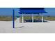 Enjoy the blue picnic pavilion with convenient outdoor shower at this beautiful beach with pristine white sand at 3030 Grand Bay Blvd # 323, Longboat Key, FL 34228