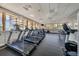 Fitness center with treadmills, exercise bikes, and floor to ceiling windows providing an airy workout space at 3030 Grand Bay Blvd # 323, Longboat Key, FL 34228
