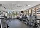 Well-equipped gym with weight machines, cardio equipment, and plenty of natural light at 3030 Grand Bay Blvd # 323, Longboat Key, FL 34228