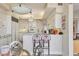 Bright eat-in kitchen with breakfast bar, perfect for casual dining and entertaining at 3030 Grand Bay Blvd # 323, Longboat Key, FL 34228