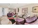Inviting living room with plush seating, colorful rug, and elegant artwork, perfect for relaxation and entertaining at 3030 Grand Bay Blvd # 323, Longboat Key, FL 34228