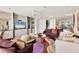 Open-concept living area showcasing contemporary design and comfortable seating, ideal for modern living at 3030 Grand Bay Blvd # 323, Longboat Key, FL 34228