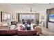 Bright and airy living room with floor-to-ceiling windows overlooking the ocean at 3030 Grand Bay Blvd # 323, Longboat Key, FL 34228