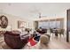 Spacious living area with elegant decor, modern furniture, and panoramic ocean views at 3030 Grand Bay Blvd # 323, Longboat Key, FL 34228