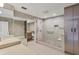 Main bathroom with a walk-in shower with a seat, granite countertops and lots of space at 3030 Grand Bay Blvd # 323, Longboat Key, FL 34228