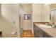 Bright bathroom features a shower-tub combo and a neutral-toned vanity with plenty of counter space at 361 Whitfield Ave, Sarasota, FL 34243