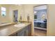 Bathroom with sink and view into the bedroom at 361 Whitfield Ave, Sarasota, FL 34243